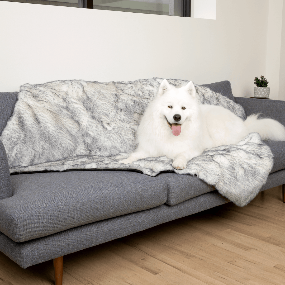 PupProtector™ Waterproof Faux Fur Blanket - American Bark Bliss